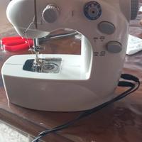 cucciola macchina da cucire