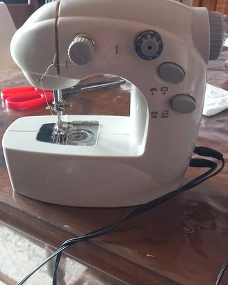 cucciola macchina da cucire