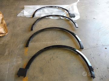 4 PARAFANGHI NERO LUCI PORSCHE CAYENNE ULTIMO MODE