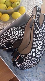 Scarpe Guess donna modello ROMY2 ZEPPA (WEDGE)