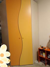 Armadio ad angolo e letto