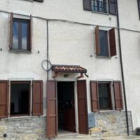 Porzione di casa con giardino