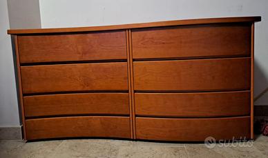 Comò moderno a onda in legno di ciliegio