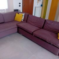 divano con tessuto repellete con letto e contenito