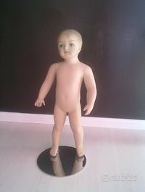 manichino infant testa scolpita