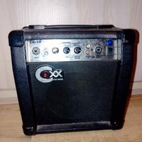 Amplificatore per chitarra elettrica e tracolla 