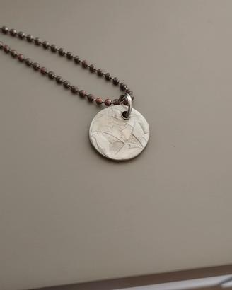 ciondolo artigianale con interno delle 1000 lire