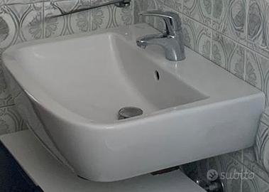 Lavabo Dolomite con miscelatore hasgrohe