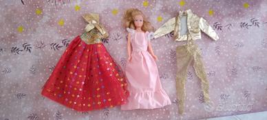 barbie skipper mattel  piu topper piu vestiti vari
