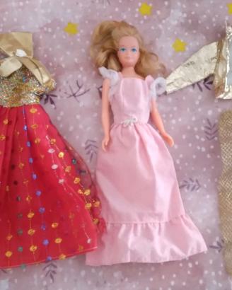 barbie skipper mattel  piu topper piu vestiti vari