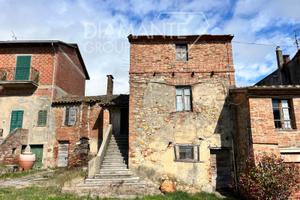 Porzione di casale su 3livelli in pietra e mattoni