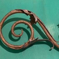 Candelabro da parete in ferro battuto