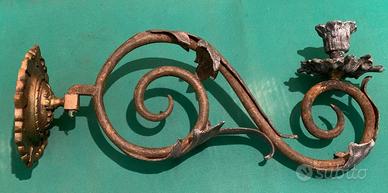 Candelabro da parete in ferro battuto