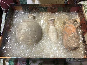 3 reperti archeologici in terracotta con ricevuta