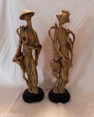 Coppia statue orientali vintage in resina decorata