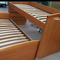letto a castello scorrevole in legno e materasso 