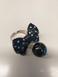 Anello con fiocco e perla nera