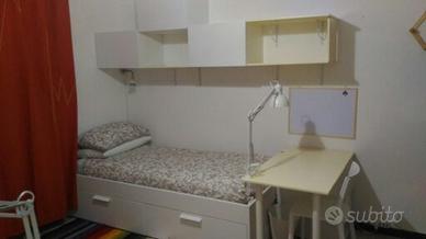 Stanza arredata via schivardi