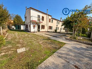 Bifamiliare con giardino e garage