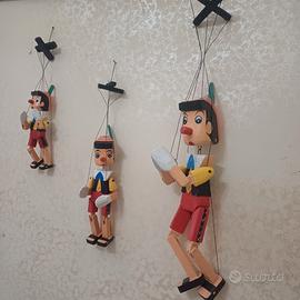 trio di burrattini pinoccchio con fili diverse mis
