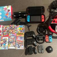 Nintendo Swich+ Volante+Ninendo sport, 10 giochi