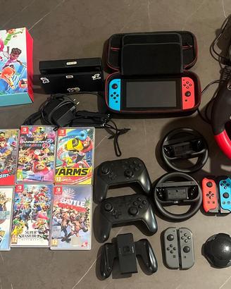 Nintendo Swich+ Volante+Ninendo sport, 10 giochi