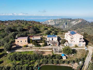 Agriturismo in collina affitta case vista lago