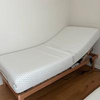 Letto con rete elettrica e materasso nuovi