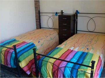 coppia di letti gemelli in ferro battuto 