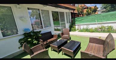 Appartamento con giardino e posto auto