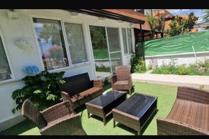 Appartamento con giardino e posto auto