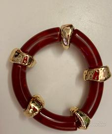 Bracciale in plastica col. bordeaux e dorato