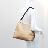 Borsa   spalla  tracolla  oro .   Parfois  .Nuova