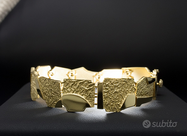 Bracciale semirigido oro giallo 18kt Rutigliano