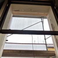 Zanzariera verticale a molla color bronzo