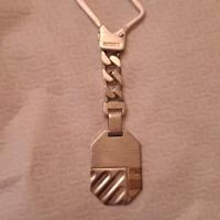 Portachiavi arg. con fascia oro