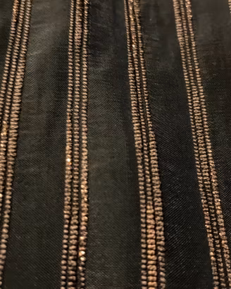 Scampolo in nylon nero e oro