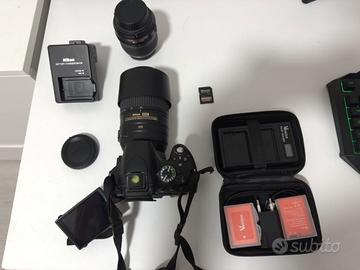 Fotocamera Nikon D5100 con obbiettivi (trattabile)