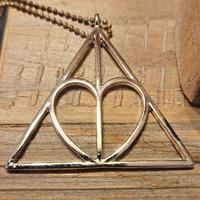 Set collana, orecchini e 2 anelli harry potter