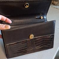 Borsa Pochette in vera pelle coccodrillo nero 