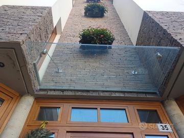 Pensilina tettoia in vetro doppio e acciaio