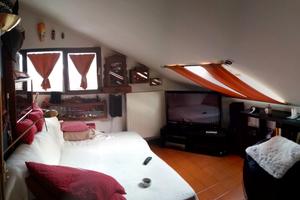 Alloggio mansardato nel verde