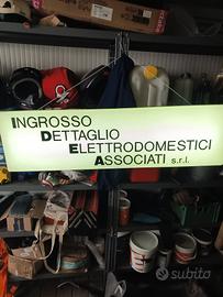insegna luminosa