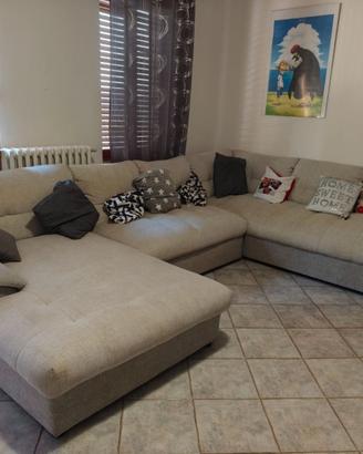 Divano letto grigo chiaro