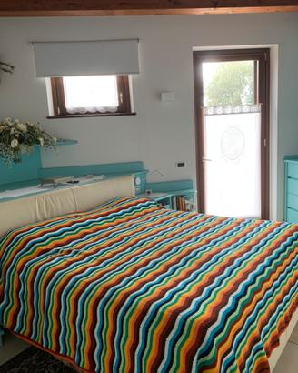 Coperta matrimoniale in lana lavorata all’unci