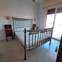 Letto matrimoniale in ottone cromato