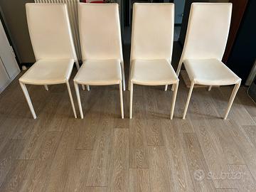 Tavolo più 4 sedie in ecopelle