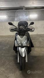 X CITY 250+ bauletto parabrezza coperta