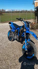 TM 125
