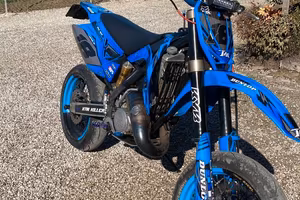 TM 125